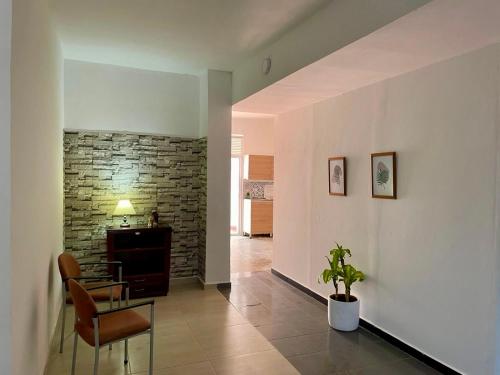 TV a/nebo společenská místnost v ubytování APARTAMENTO COMPLETO, Piedra viva