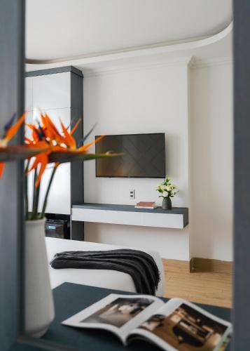 TV a/nebo společenská místnost v ubytování Nature Hotel Da Lat - Le Dai Hanh