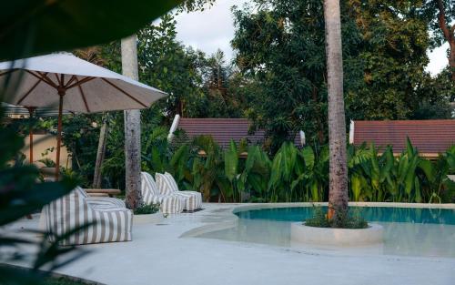 Bazén v ubytování Loku Kedungu - Boutique Resort nebo v jeho okolí