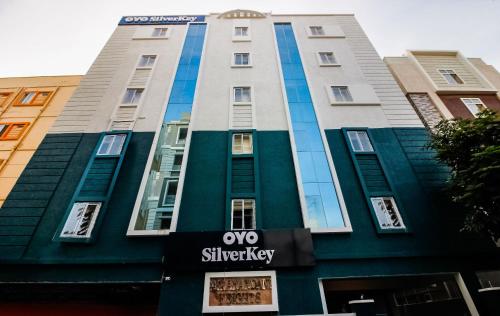 a building with a sign in front of it at Hotel O GACHIBOWLI BESIDE DLF in Hyderabad