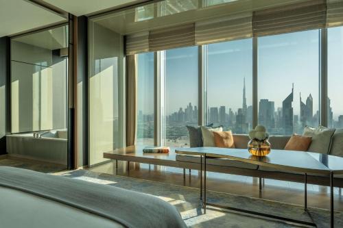 a living room with a view of a city at One&Only One Za'abeel in Dubai