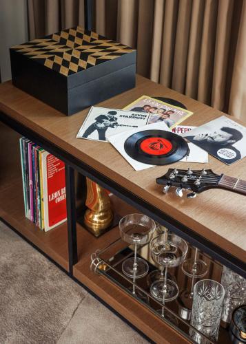 a coffee table with a record player and a box at One&Only One Za'abeel in Dubai