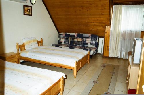 Postel nebo postele na pokoji v ubytování Cesar Guest Rooms