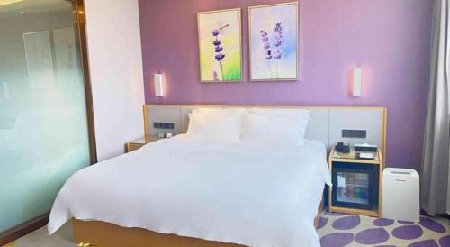 Letto o letti in una camera di Lavande Hotel·Yichun Wanda, High Speed Railway Station