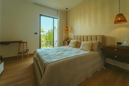 Ένα ή περισσότερα κρεβάτια σε δωμάτιο στο Downtown Punta Cana Central Park 1 BR First Floor A-103