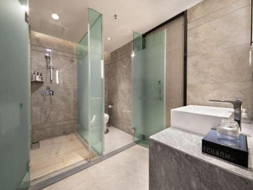 Ένα μπάνιο στο Echarm Hotel Jiayulongwan Peninsula