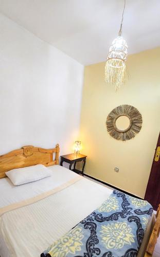Postel nebo postele na pokoji v ubytování Vibe Surf Morocco
