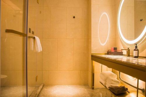 Ένα μπάνιο στο Echeng Hotel Enshi Minzu Road