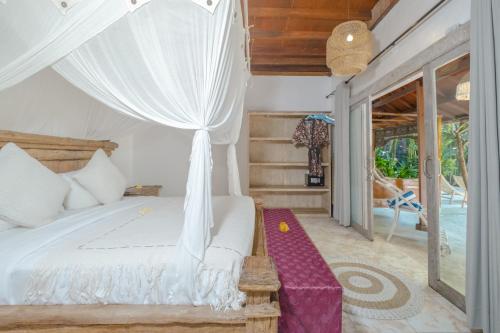Ένα ή περισσότερα κρεβάτια σε δωμάτιο στο The Ocean Luxury Villas Resort