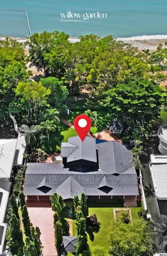 an overhead view of a house with a red heart on it at Willow Garden Stays Cairns - Beachfront 4 Bedroom Luxury Holiday Home in Kewarra Beach