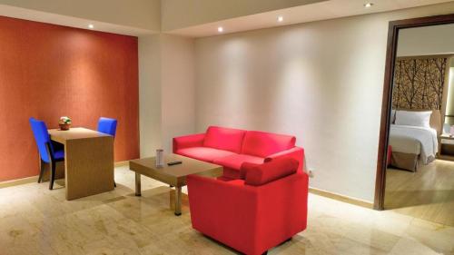 Χώρος καθιστικού στο CLARO Makassar Hotel & Convention