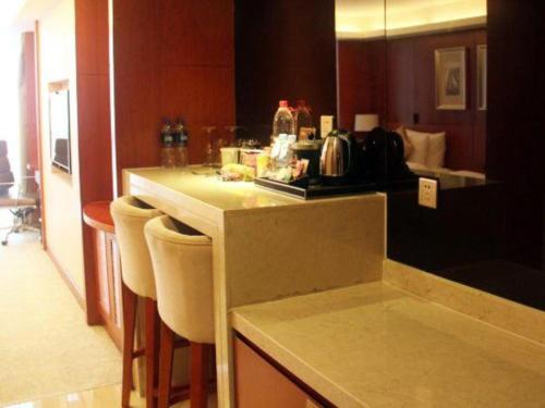 Posezení v ubytování Xian Qujiang Yinzuo Hotel
