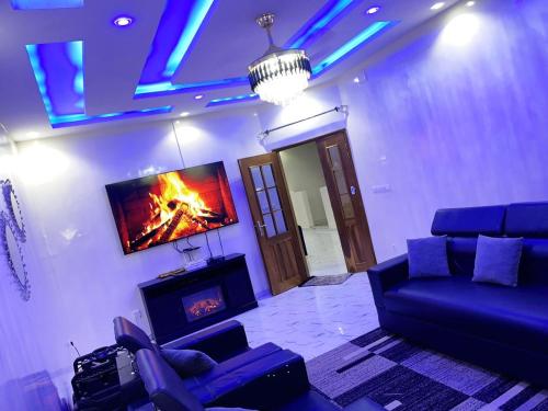 TV a/nebo společenská místnost v ubytování 2chambres salon villa Thierno sene