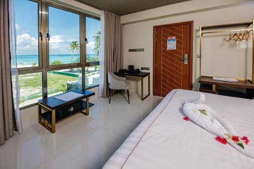 Katil atau katil-katil dalam bilik di Royal Villa Fulidhoo