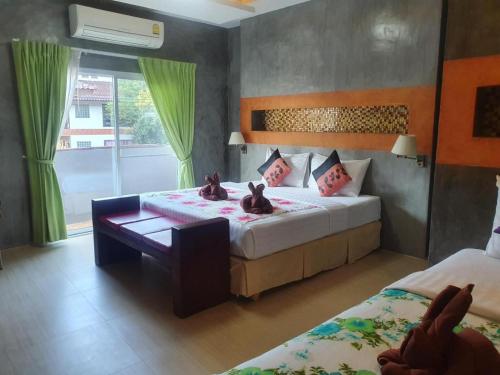 Letto o letti in una camera di Saikaew Boutique Hotel