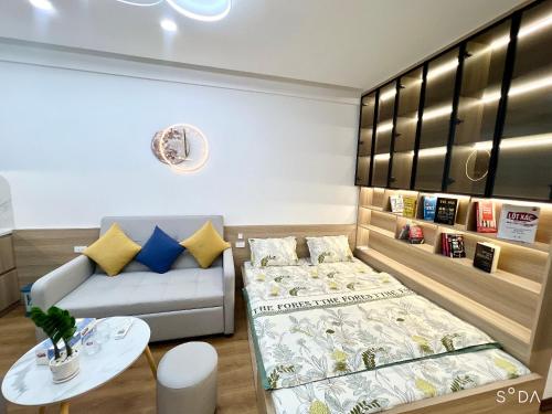 Ένα ή περισσότερα κρεβάτια σε δωμάτιο στο Evergreen Bac Giang apartment