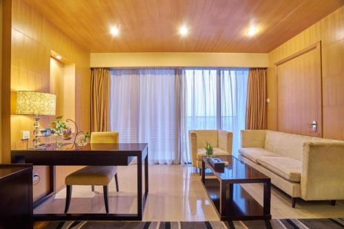 Χώρος καθιστικού στο Huangshan Xuanyuan International Hotel
