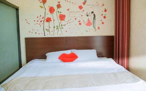 Katil atau katil-katil dalam bilik di Shell Zaozhuang Taierzhuang Ancient City East Gate Hotel