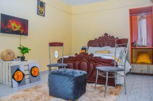 TV a/nebo společenská místnost v ubytování Marvel Homes
