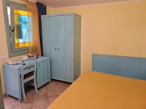 Postel nebo postele na pokoji v ubytování Hotel Del Corso