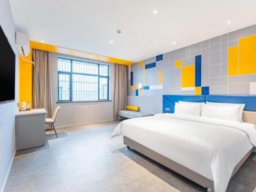 Katil atau katil-katil dalam bilik di 7 Days Inn Changsha Xingsha Zhongmaocheng Windows of the World