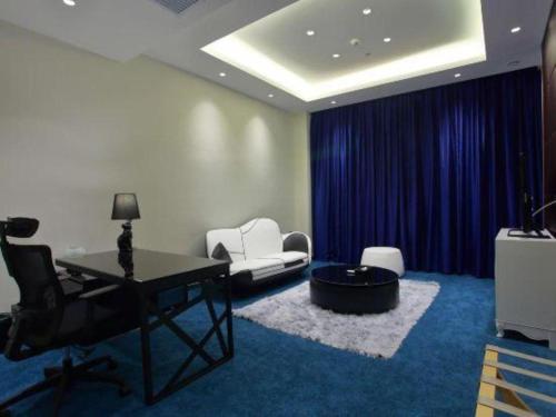 Χώρος καθιστικού στο Harbin Ju Jian Hotel