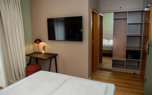 Postel nebo postele na pokoji v ubytování Villa Waldperlach by Blattl