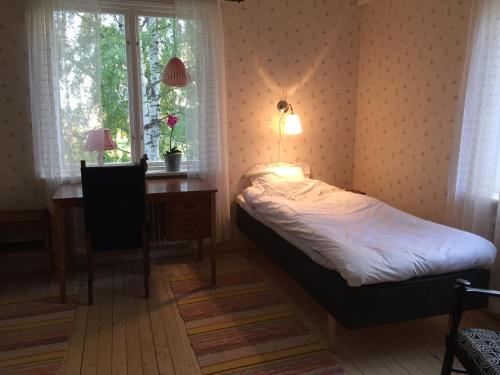 Posteľ alebo postele v izbe v ubytovaní Villa Insikt Pensionat & Kursgård