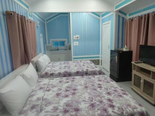 Postel nebo postele na pokoji v ubytování Nam Khong Tara Resort