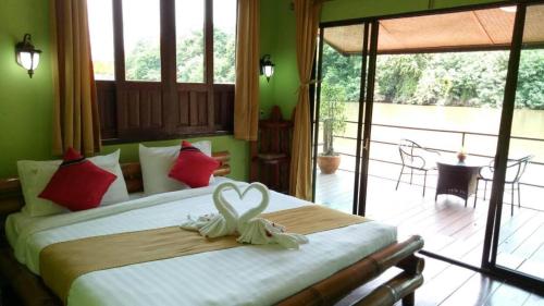 Postel nebo postele na pokoji v ubytování Banana Resort & Spa