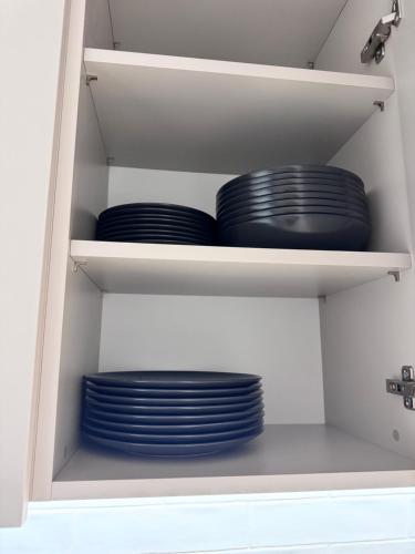 a couple of plates are sitting on a shelf at Forest Apart V in Warsaw