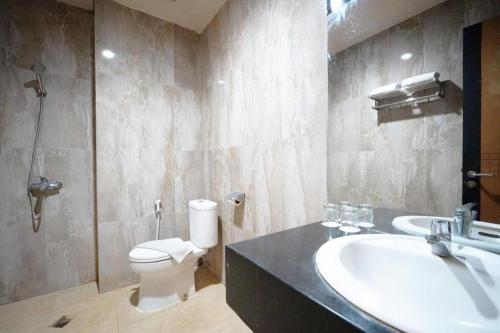 Ένα μπάνιο στο Sapadia Hotel Cirebon