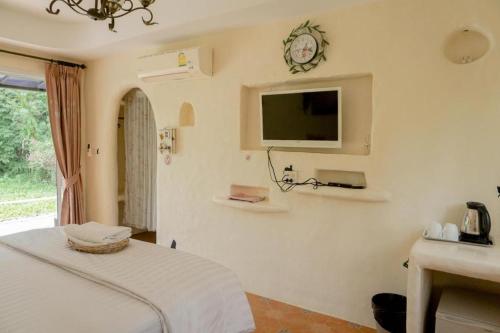 TV a/nebo společenská místnost v ubytování Dandelion Resort