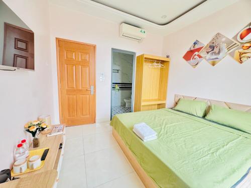 Kuchyň nebo kuchyňský kout v ubytování Mila Homestay Grand World Phú Quốc