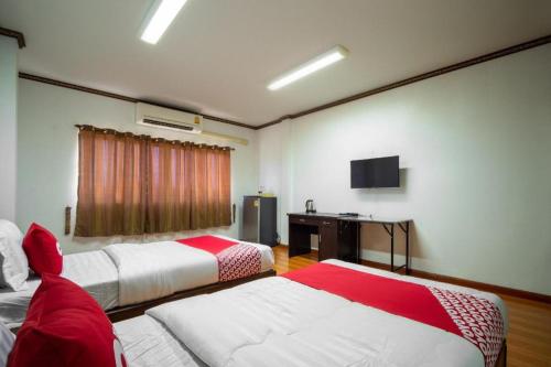 Кровать или кровати в номере OYO 836 PK Residence