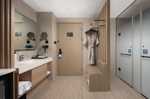 Bilik mandi di Wanda Yue Hotel Tangshan North Station