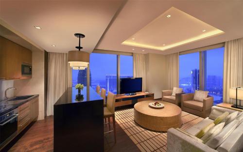 TV a/nebo společenská místnost v ubytování Grand Hyatt Macau