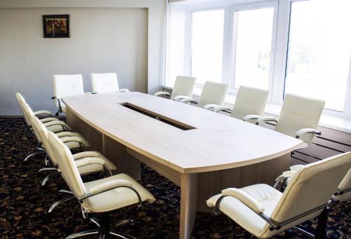 a conference room with a large table and chairs at Tourist Hotel Complex in Kyiv