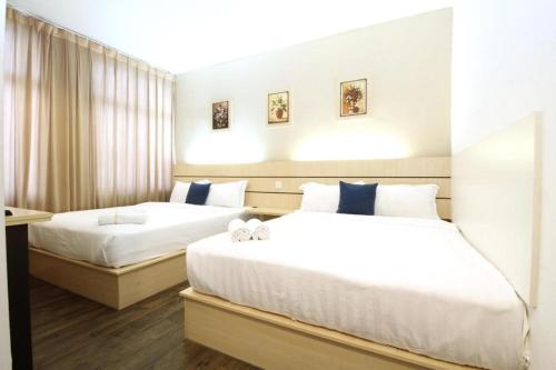 Katil atau katil-katil dalam bilik di Grand Kapar Hotel Klang Sentral