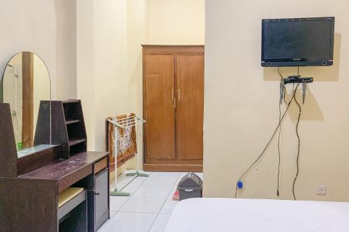 Μια τηλεόραση ή/και κέντρο ψυχαγωγίας στο Urbanview Hotel Hikmah Syariah Majalengka