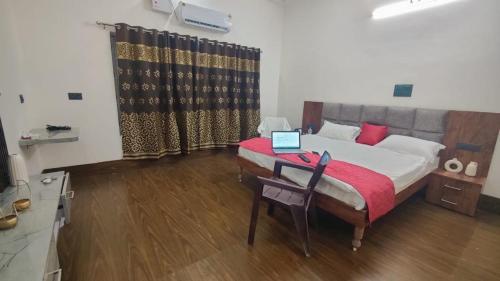 Letto o letti in una camera di Geetatri Luxury Homestay