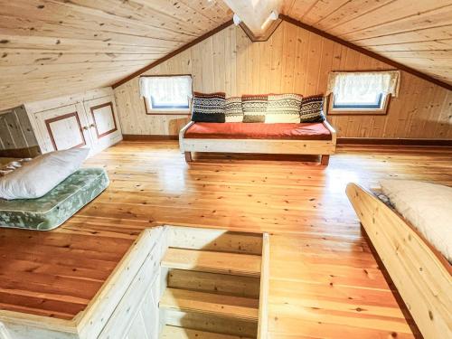 a room with two beds in a cabin at 4 star holiday home in gol in Gol