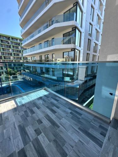 a balcony with a view of a building at DAW Studio in Mamaia Nord