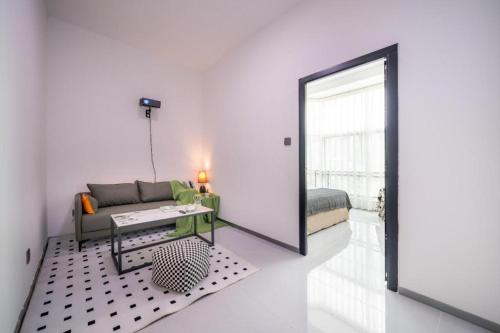 Katil atau katil-katil dalam bilik di Xicheng Administrative Apartment (Shenzhen North Station Longhua Yifangcheng Branch)