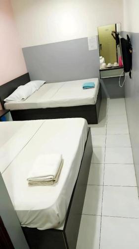 Gambar di galeri bagi Hotel CheckedInn di Ipoh