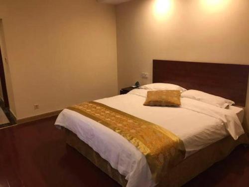 Letto o letti in una camera di GreenTree Inn Changshu South HaiYu Road Pedestrian Street Business Hotel