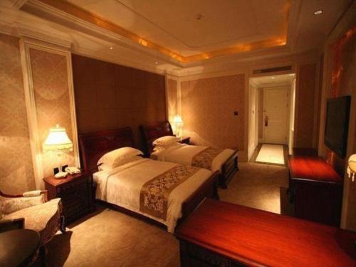 Letto o letti in una camera di GreenTree Inn Changshu South HaiYu Road Pedestrian Street Business Hotel