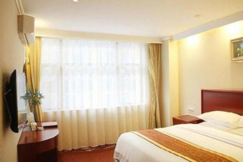 Letto o letti in una camera di GreenTree Inn Changshu South HaiYu Road Pedestrian Street Business Hotel