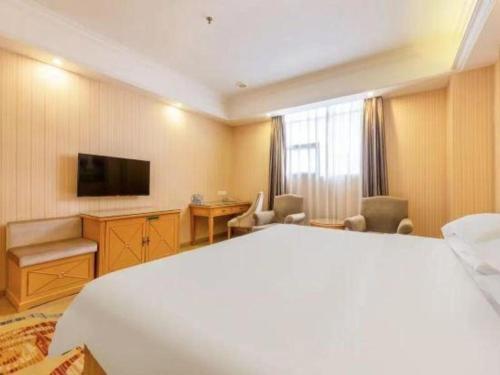 TV o dispositivi per l'intrattenimento presso Vienna 3 Best Hotel Shenzhen Bantian Guangya Park Metro Station