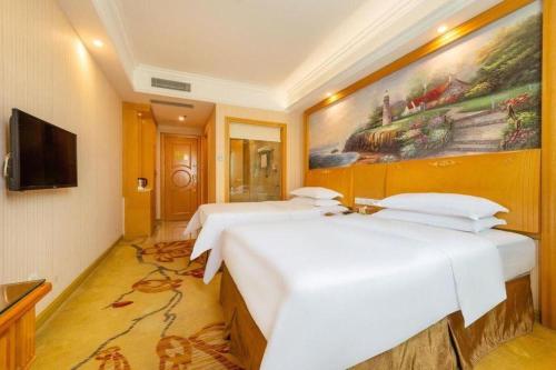 Letto o letti in una camera di Vienna 3 Best Hotel Shenzhen Bantian Guangya Park Metro Station